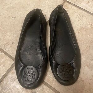 Well worn leather flats